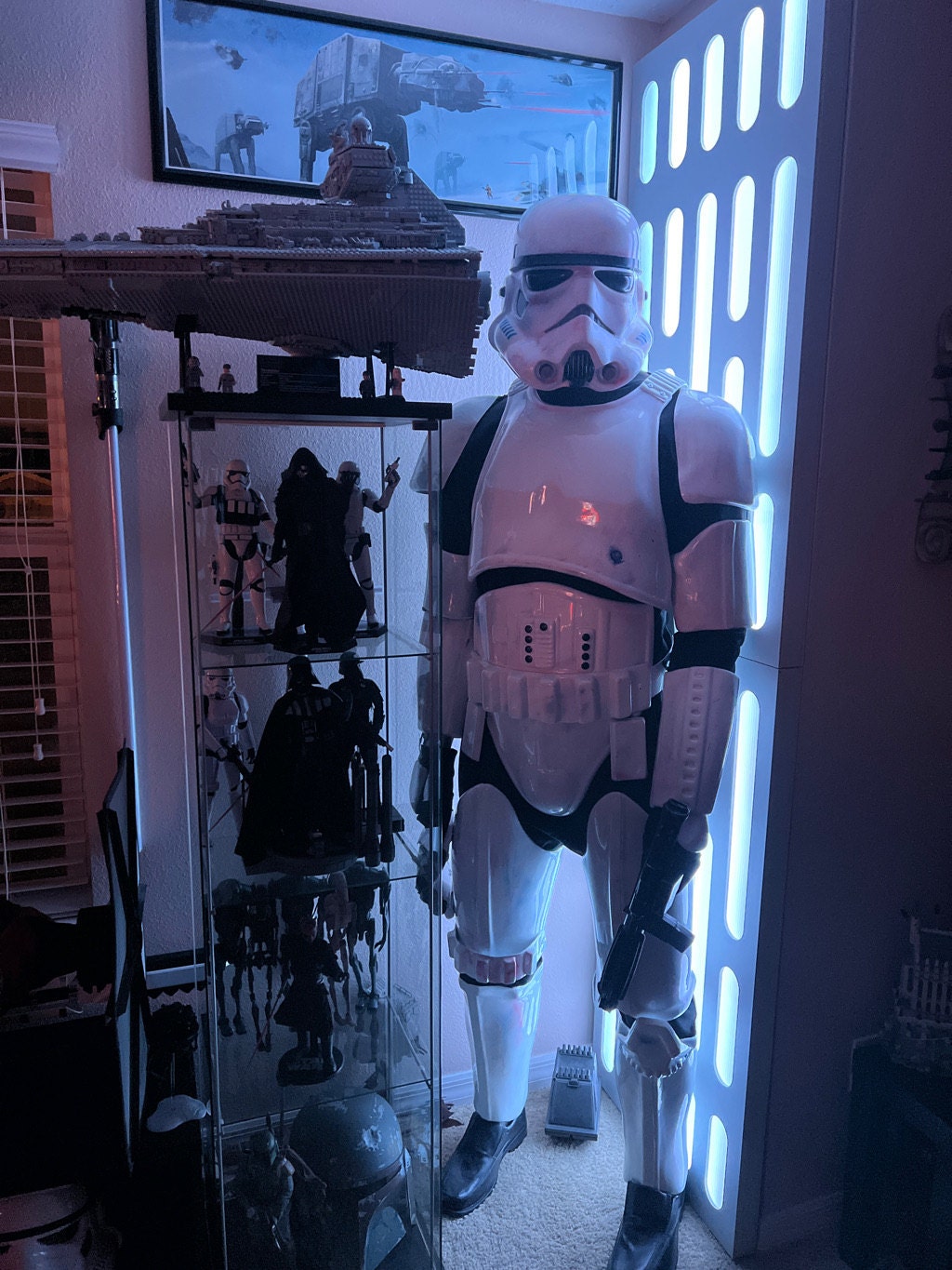 Death Star Wall next to Star Wars strom trooper display